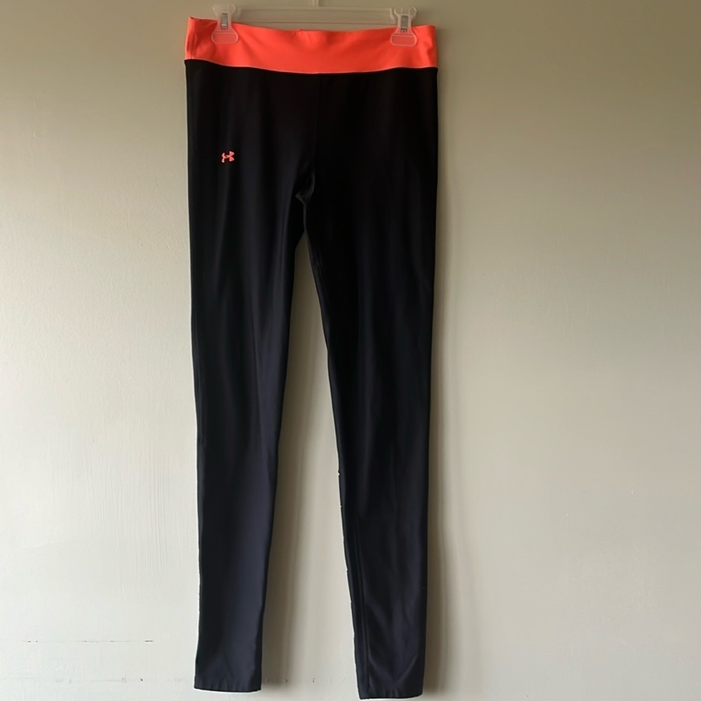 Women’s neon pink/black under armor leggings. Size medium. good used condition